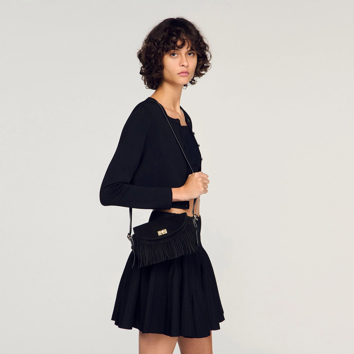 Sandro "Mini Mambo" Fringed Suede Bag in Black
