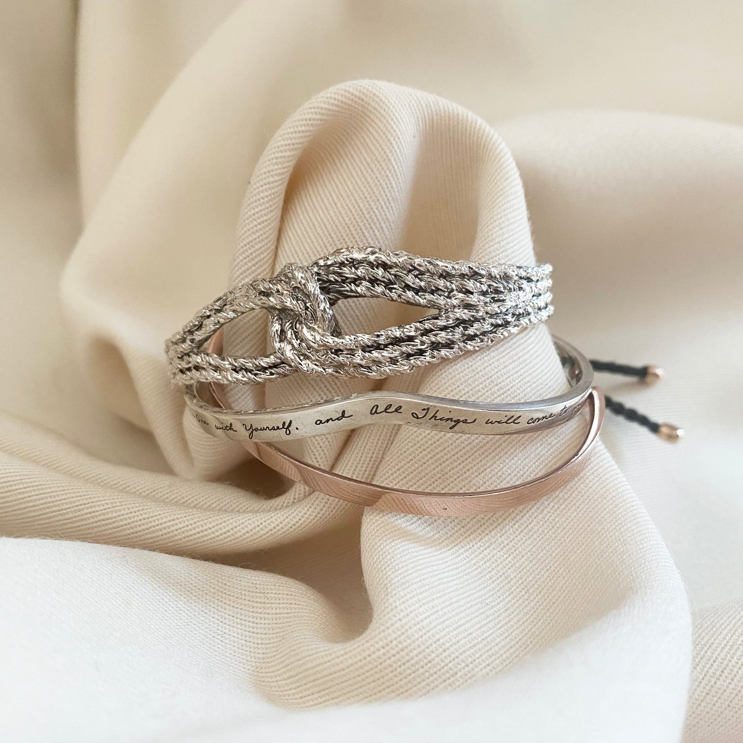 Aurelie Bidermann Silver "Lasso" Cuff, BB Becker Silver Bracelet, and Monica Vinader Friendship Braclelet