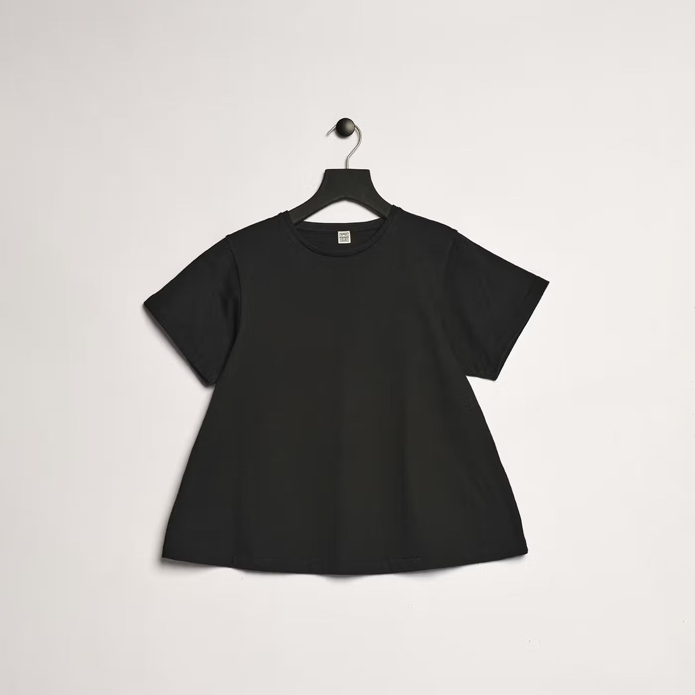 Toteme "Pemba" Flared Baby Tee in Black, size Medium