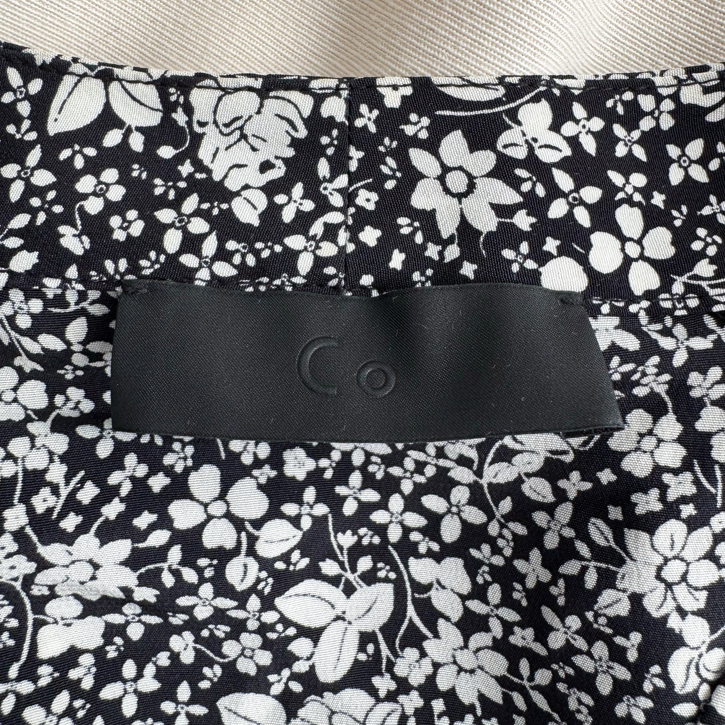 Co Floral Silk Wrap Top with Flared Sleeves in Black/Cream, size Small