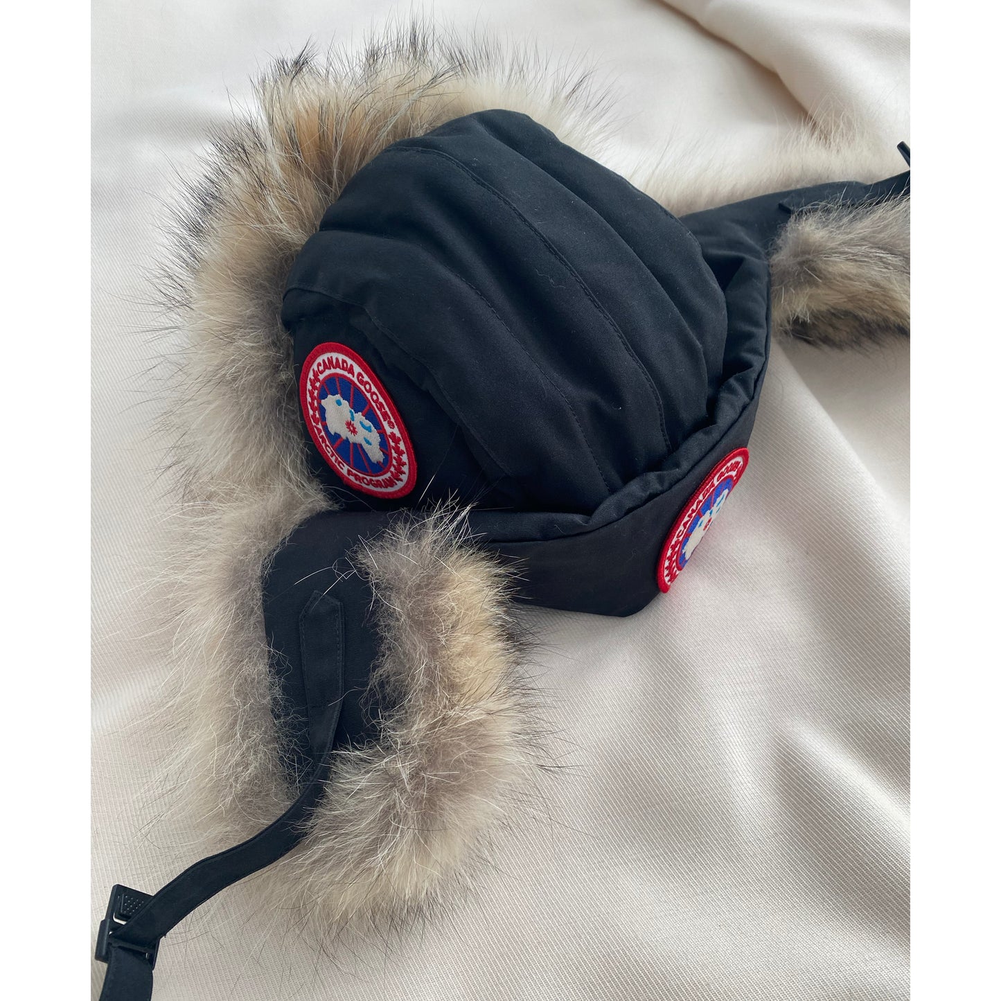 Canada Goose Fur Trimmed Trapper Hat in Black, size S/M