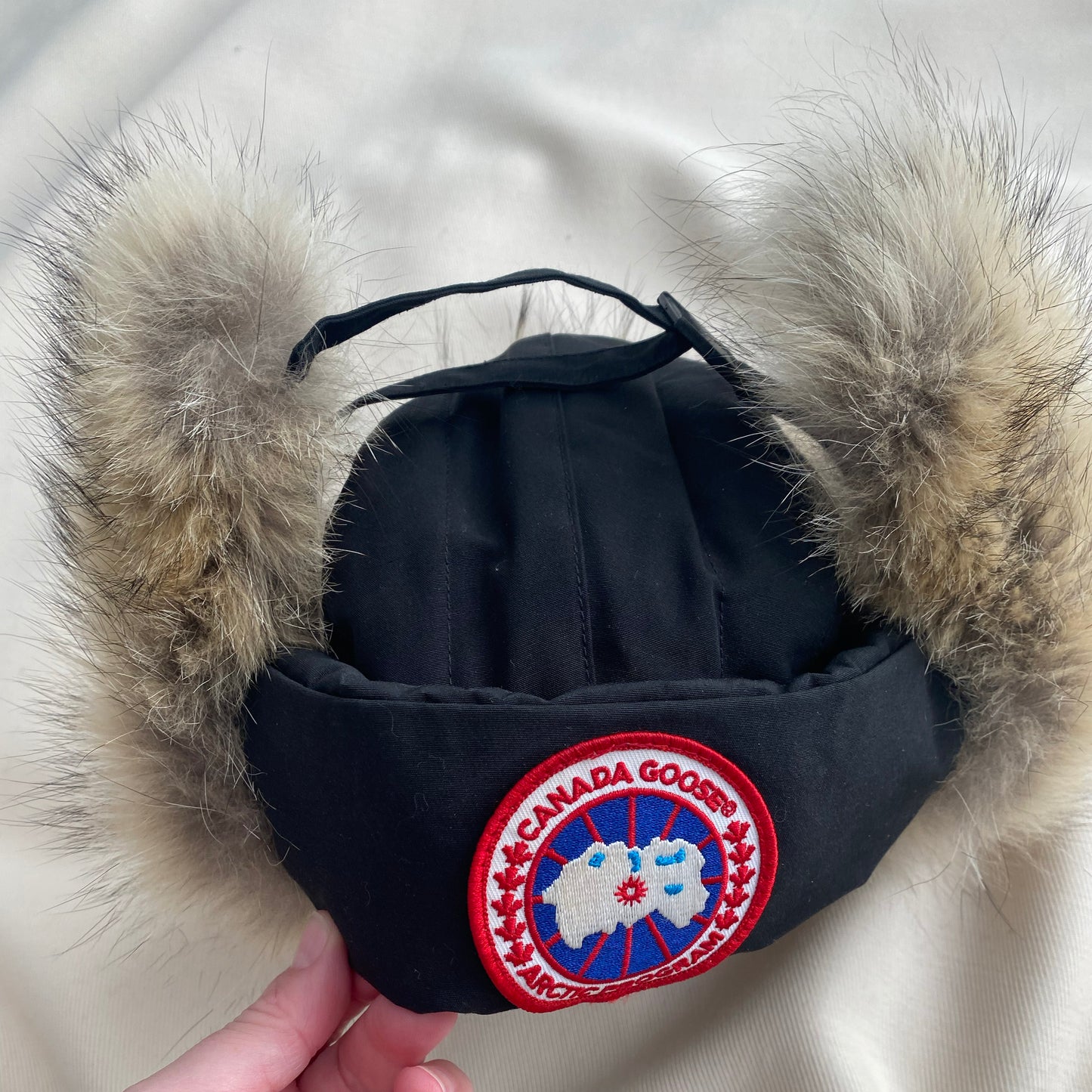 Canada Goose Fur Trimmed Trapper Hat in Black, size S/M