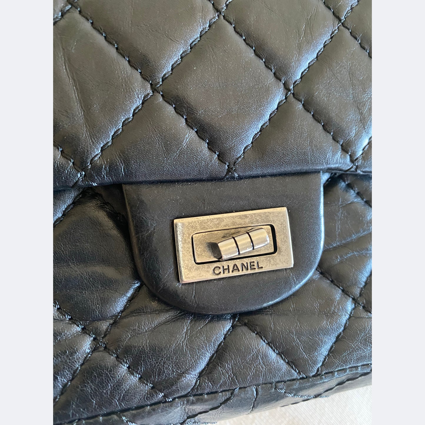 Chanel Black aged calfskin leather Re-issue 2.55 Bag