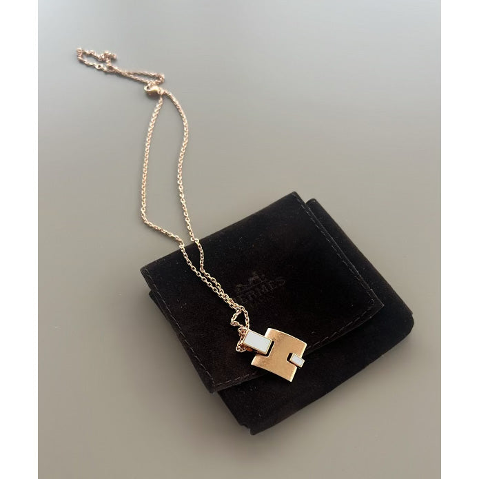 Hermes "Eileen" Necklace in Rosegold with White Enamel