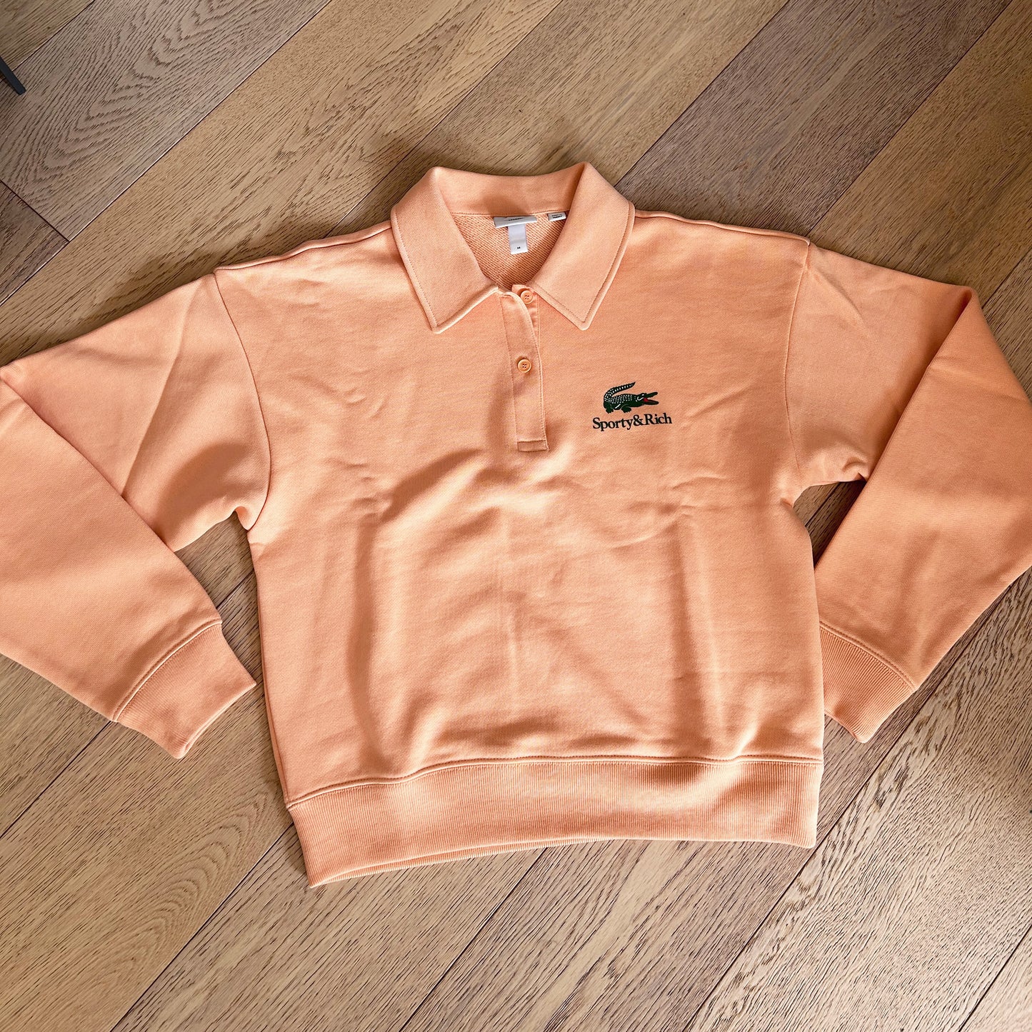 Sporty & Rich x Lacoste Polo Neck in Orange, size 34 (XS)