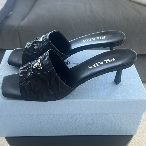 Prada Triangle Logo Mules in Black, size 41