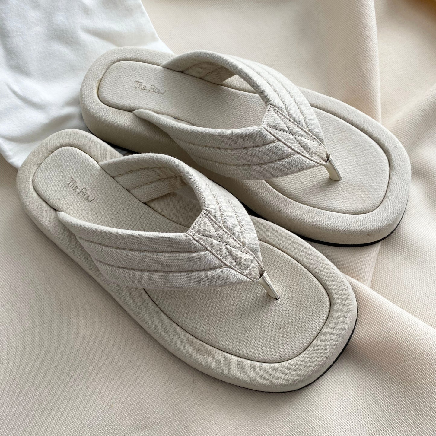 The Row "Ginza" Slides in Ivory Canvas, size 39