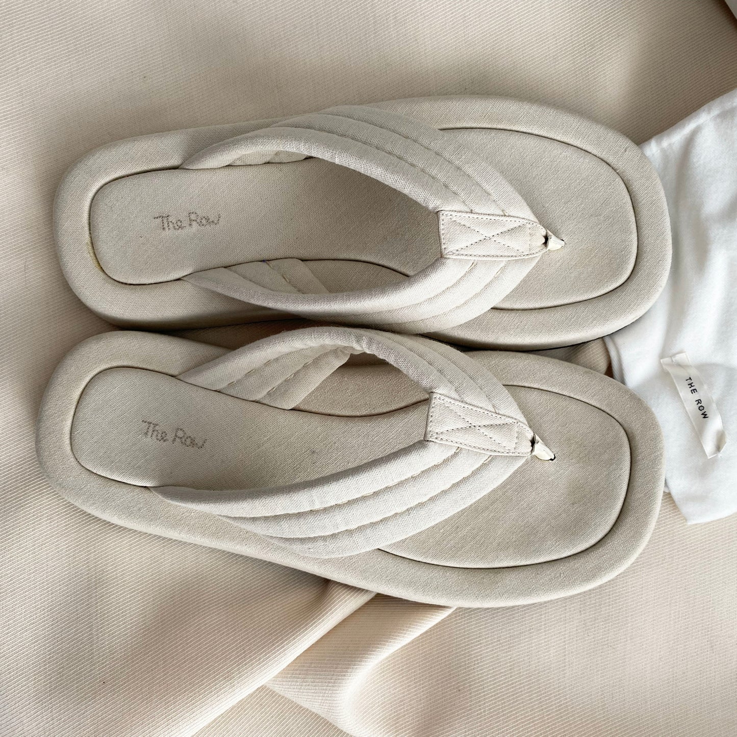 The Row "Ginza" Slides in Ivory Canvas, size 39