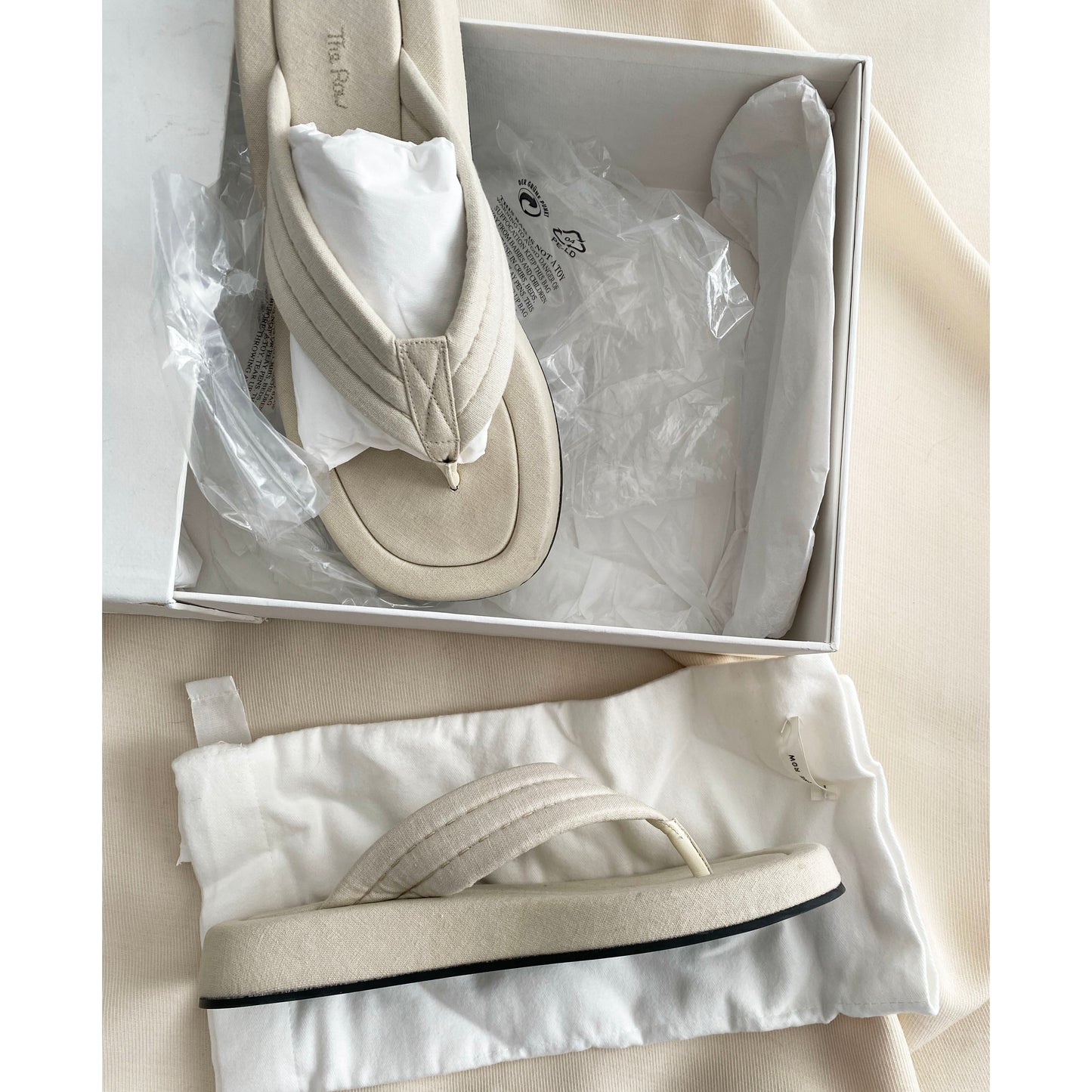 The Row "Ginza" Slides in Ivory Canvas, size 39