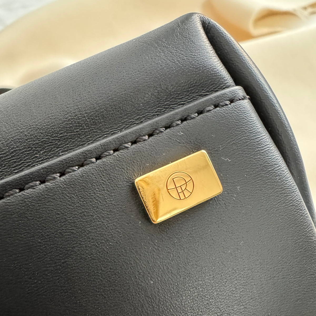 The Row "Sidekick" Bag in Black