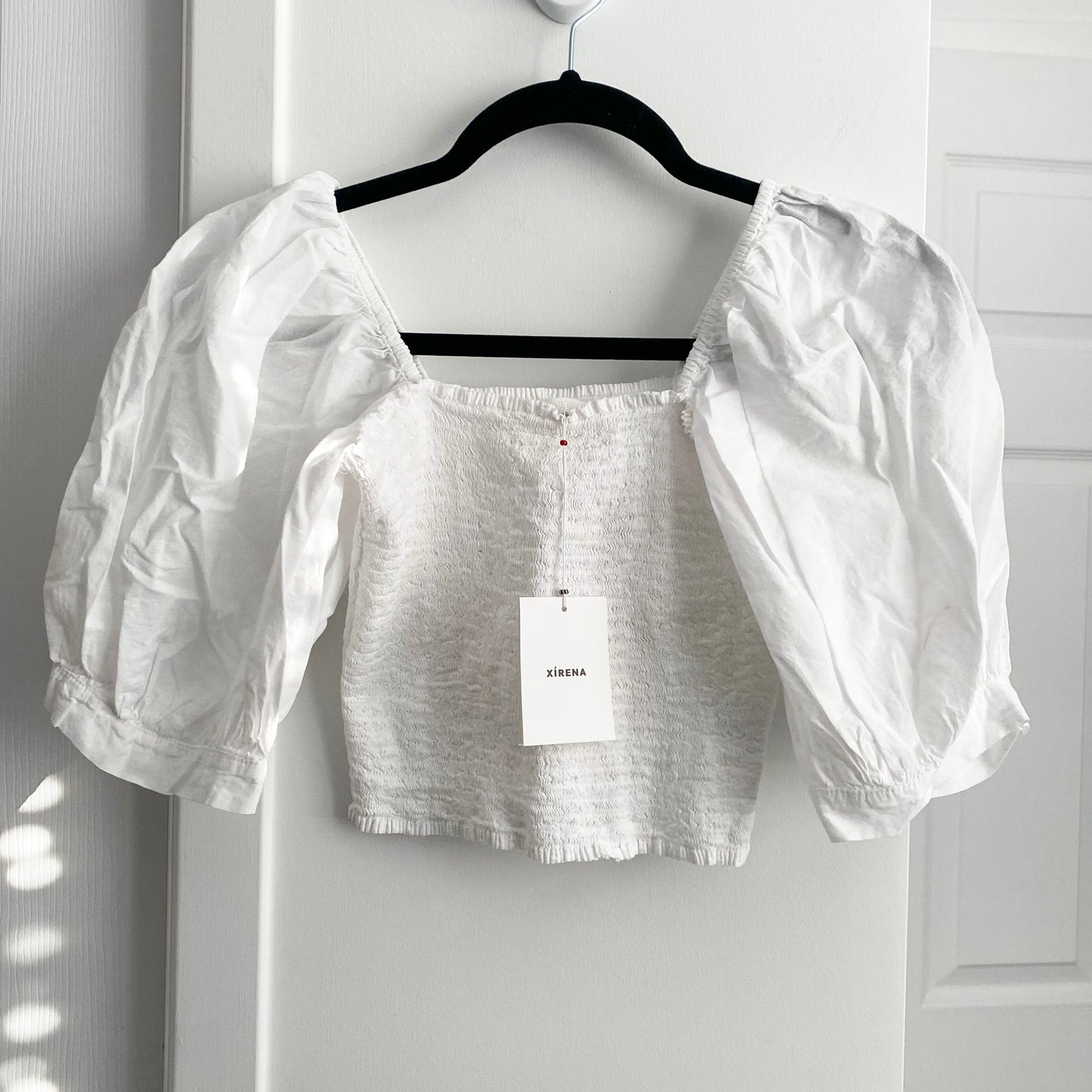 Haut Xirena « Issa » en blanc, taille Small (convient comme XS)