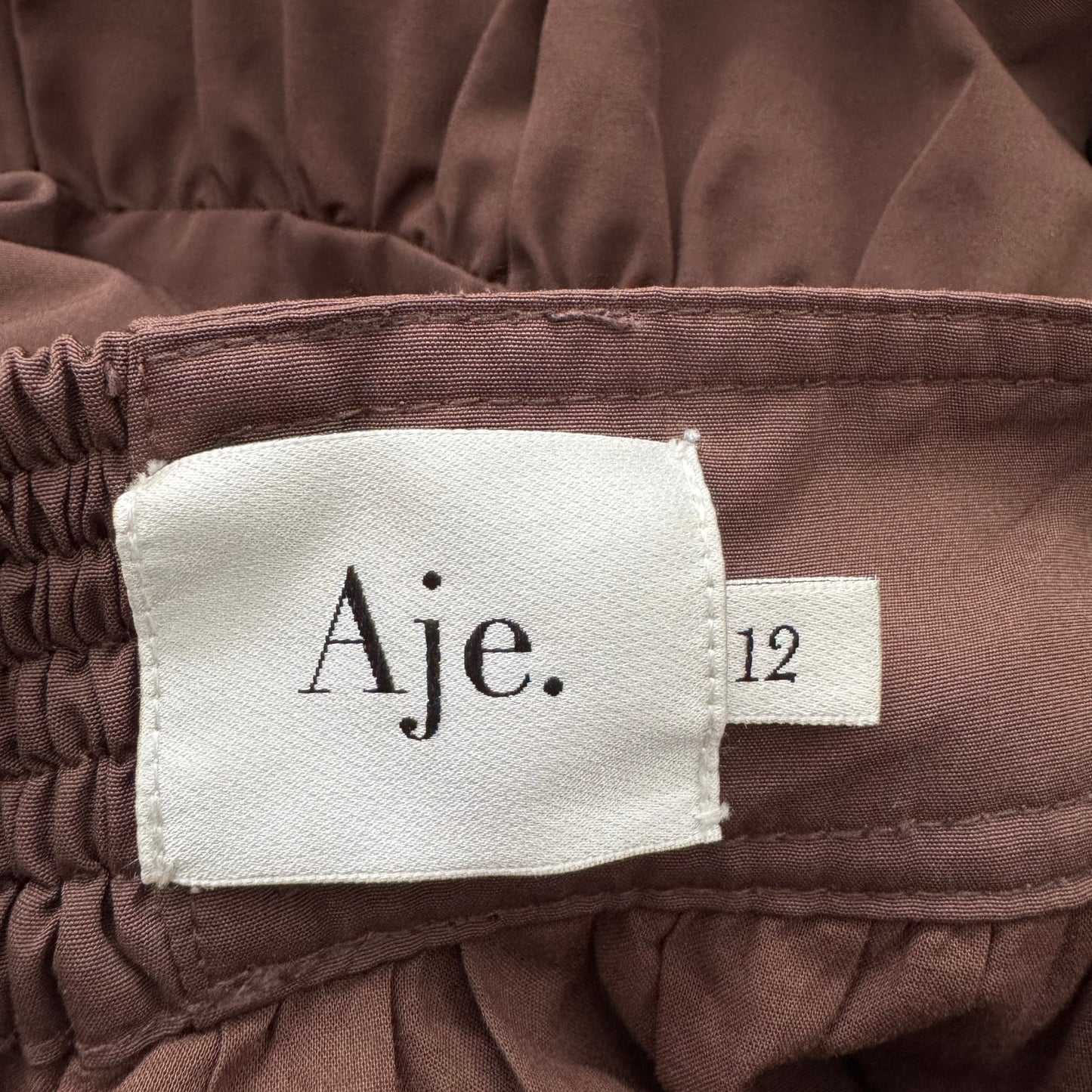 AJE Tiered Midi Skirt in Brown, size 8US/12UK