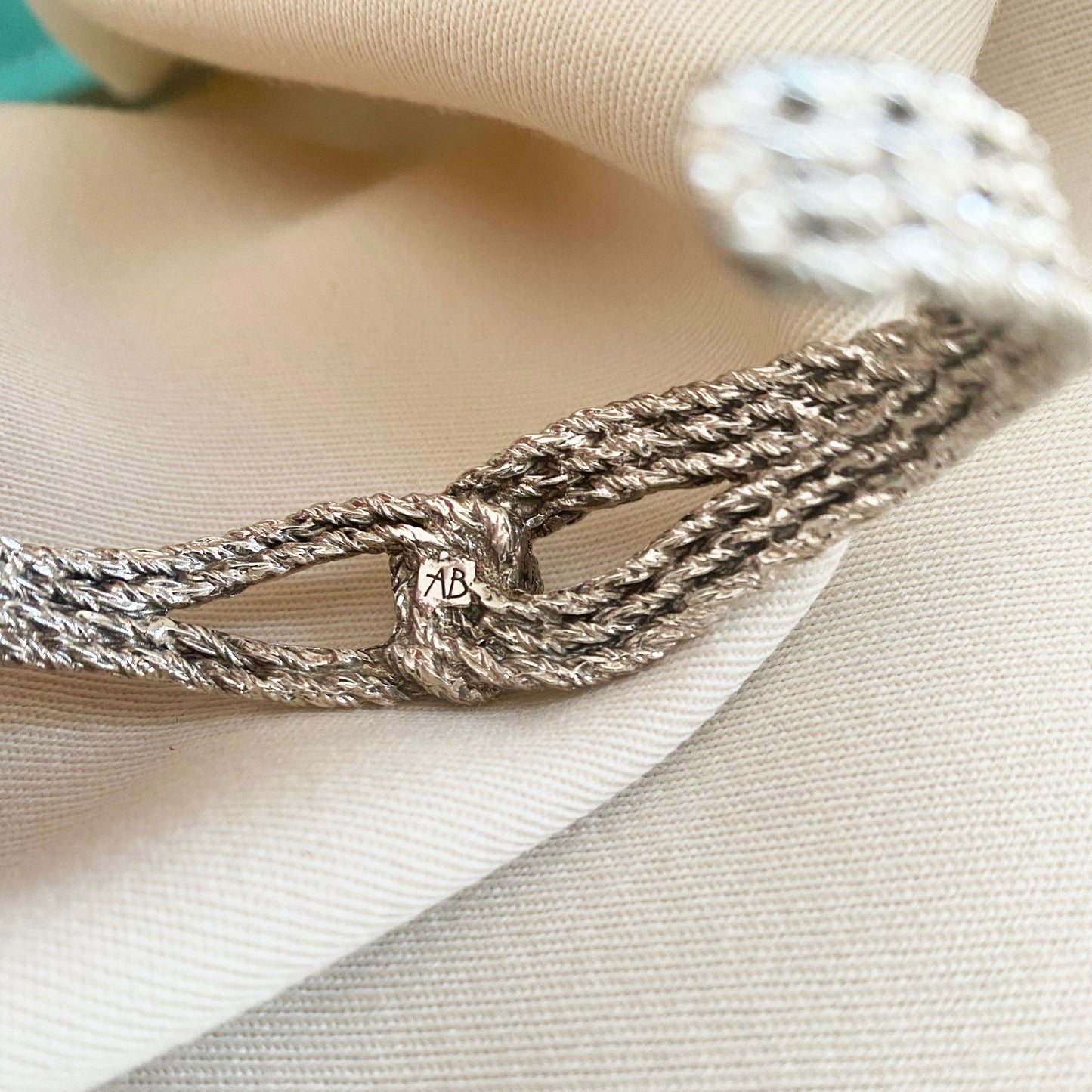 Aurelie Bidermann Silver "Lasso" Cuff, BB Becker Silver Bracelet, and Monica Vinader Friendship Braclelet