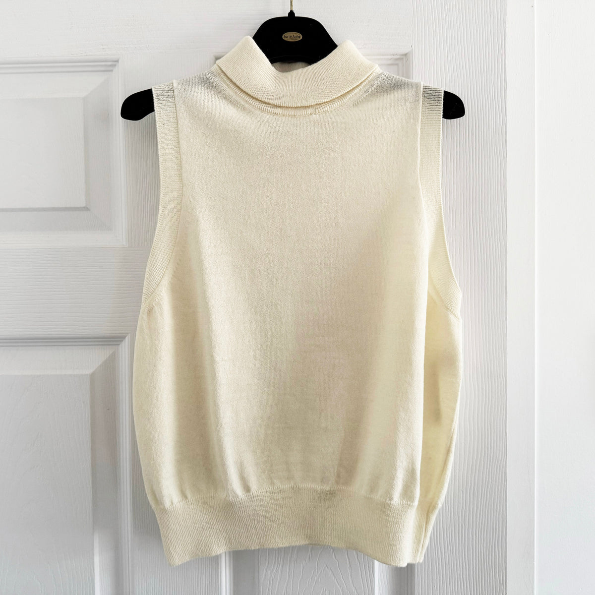 Celine Sleeveless Knit Turtleneck in Cream, size Medium (fits Small)