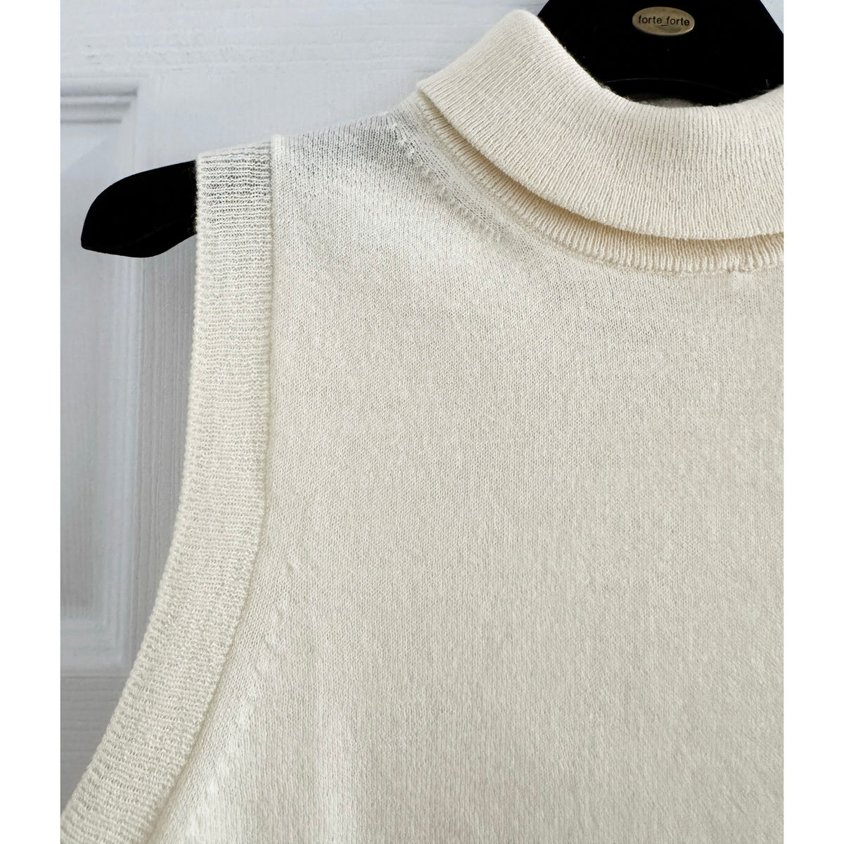 Celine Sleeveless Knit Turtleneck in Cream, size Medium (fits Small)