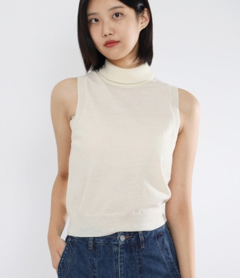 Celine Sleeveless Knit Turtleneck in Cream, size Medium (fits Small)