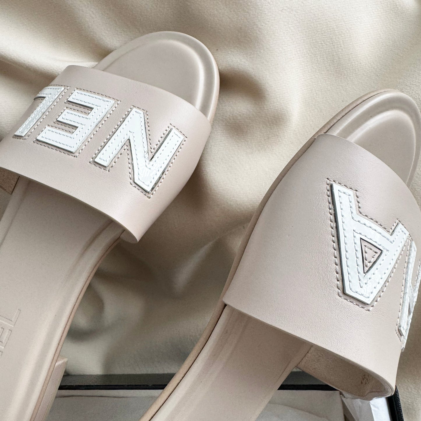 Chanel Flat Logo Slides in Blush/White, size 41C