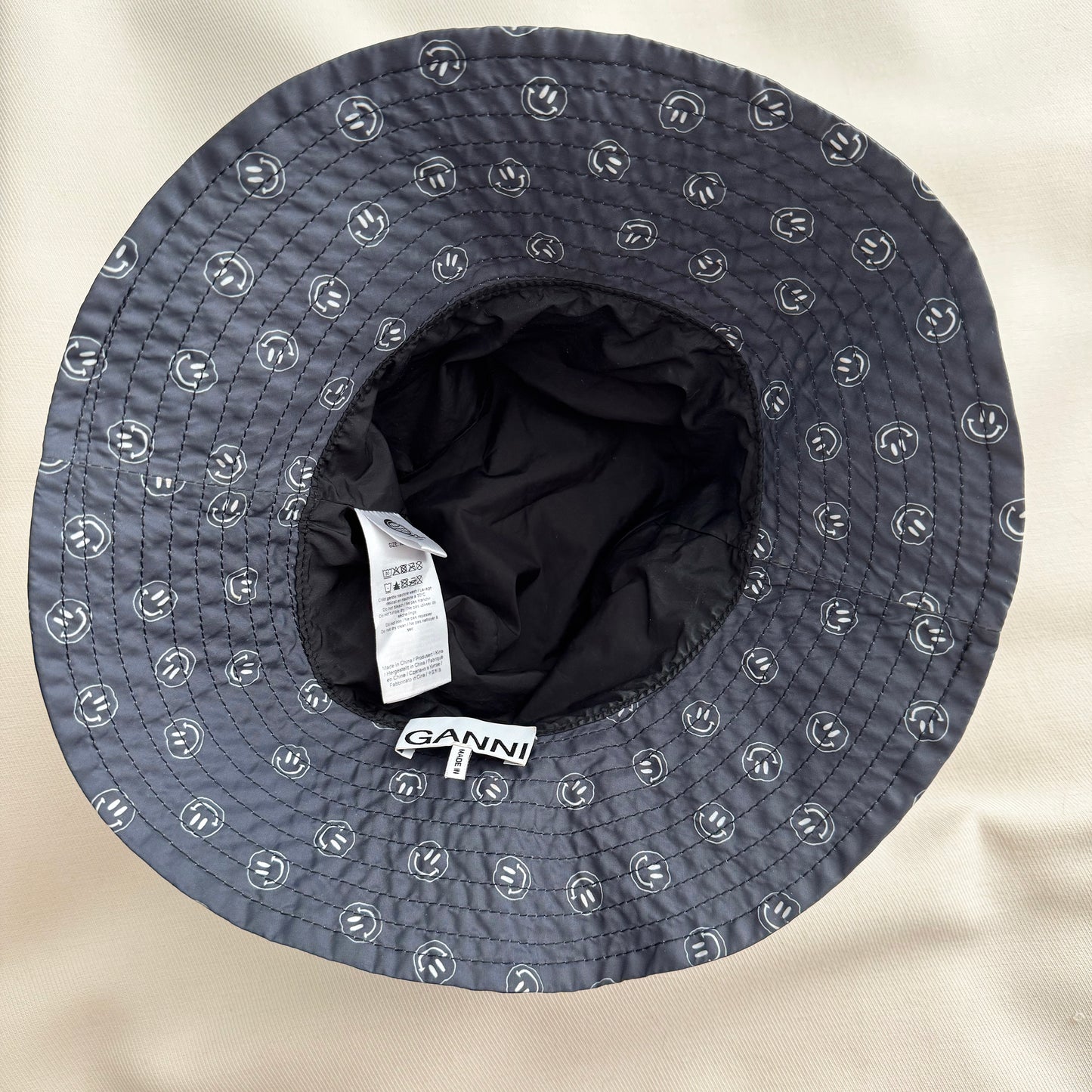Ganni Printed Bucket Hat in "Phantom", size XS/S