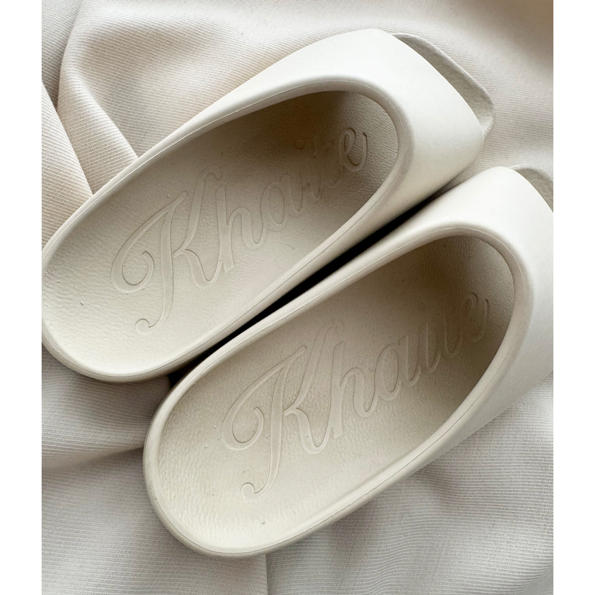 Khaite "Brighton" Rubber Slides in Ivory, size 39