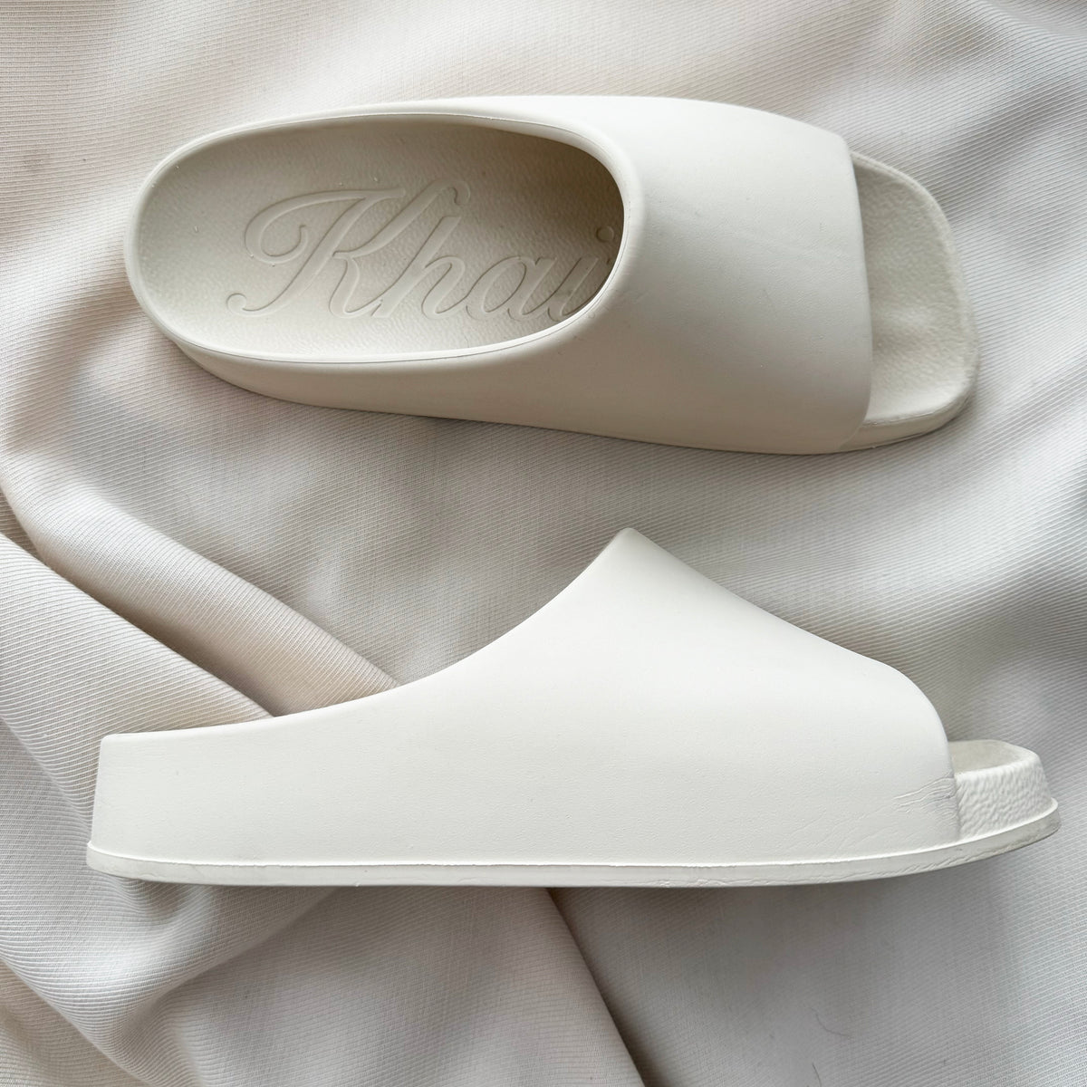 Khaite "Brighton" Rubber Slides in Ivory, size 39