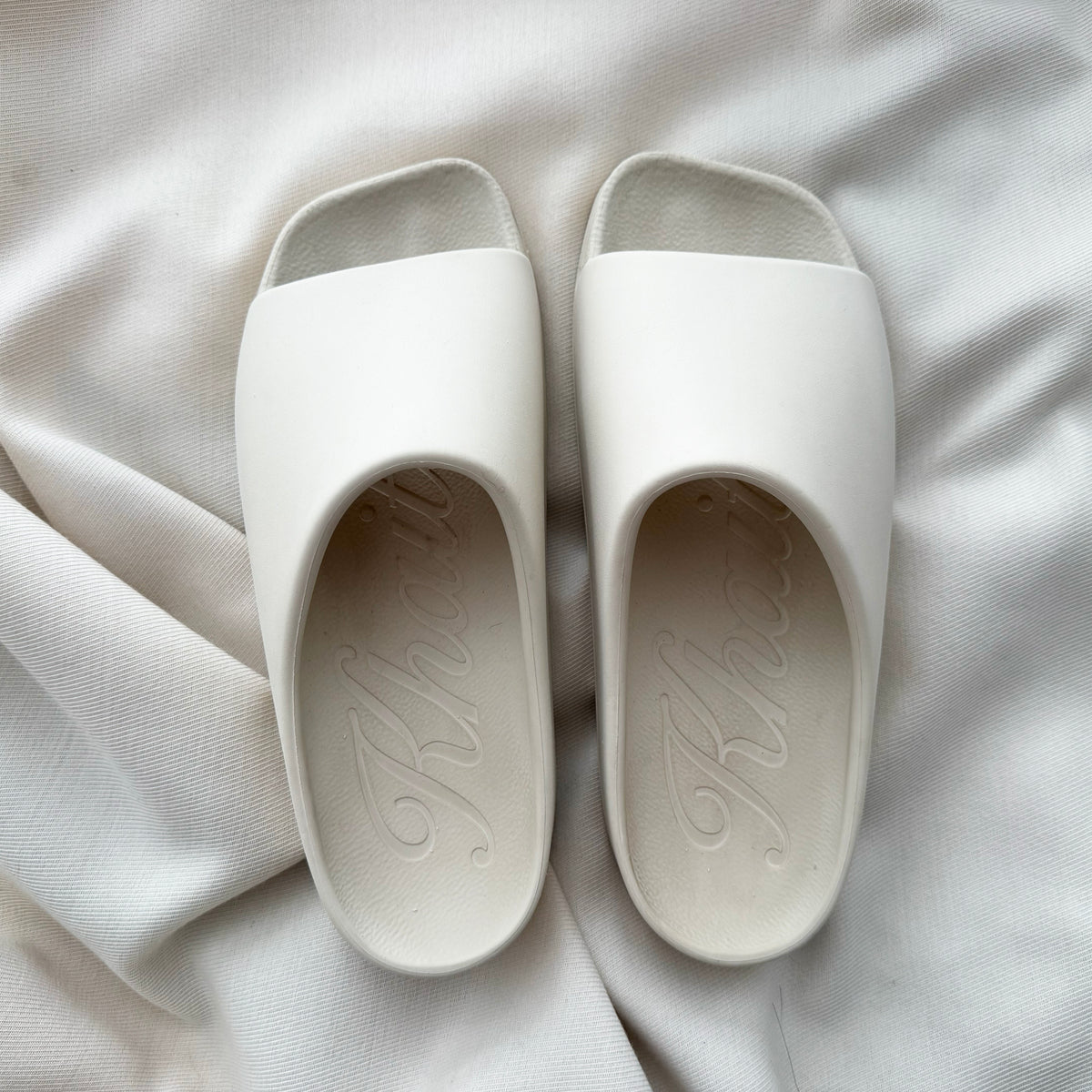Khaite "Brighton" Rubber Slides in Ivory, size 39