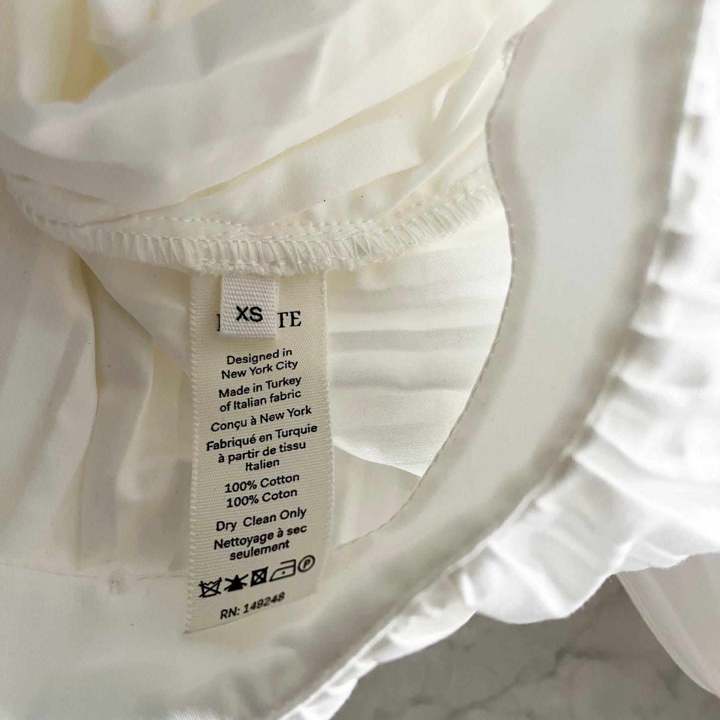 Khaite "Malone" Plisse Cocoon blouse in White, size XS