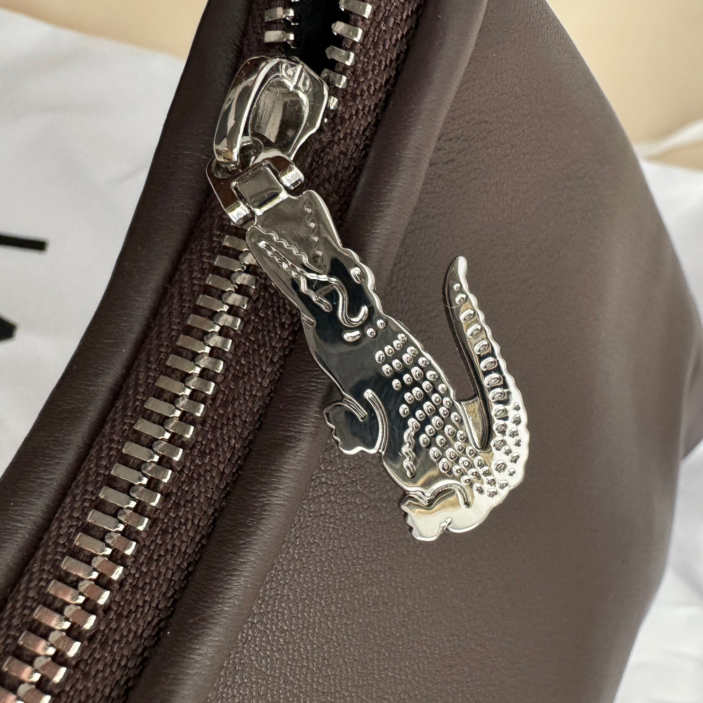 Lacoste Small "Lenglen" Pleated Leather Bag in Brown