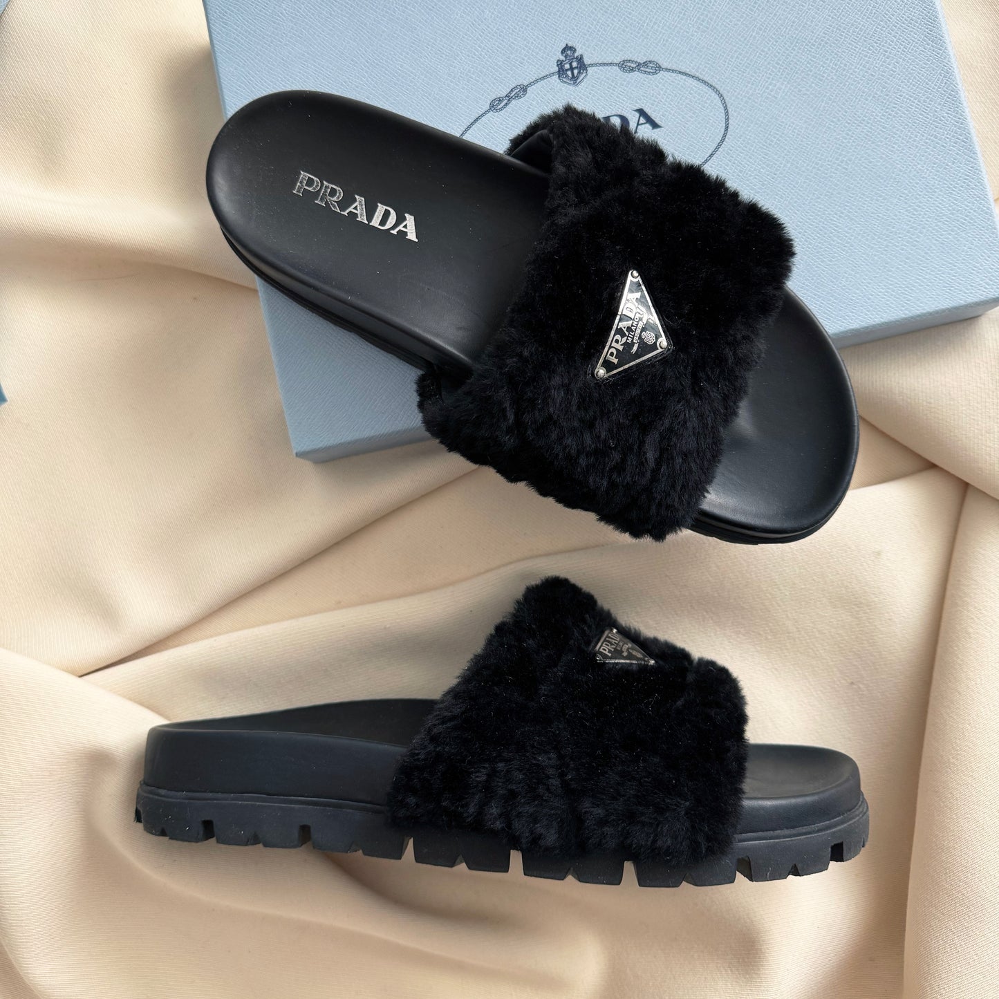 Prada Shearling Fur Slides in Black, size 41