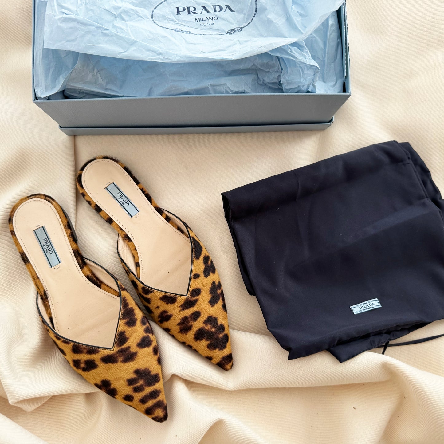 Prada Leopard Print Calf Hair Flat Mules, size 37.5