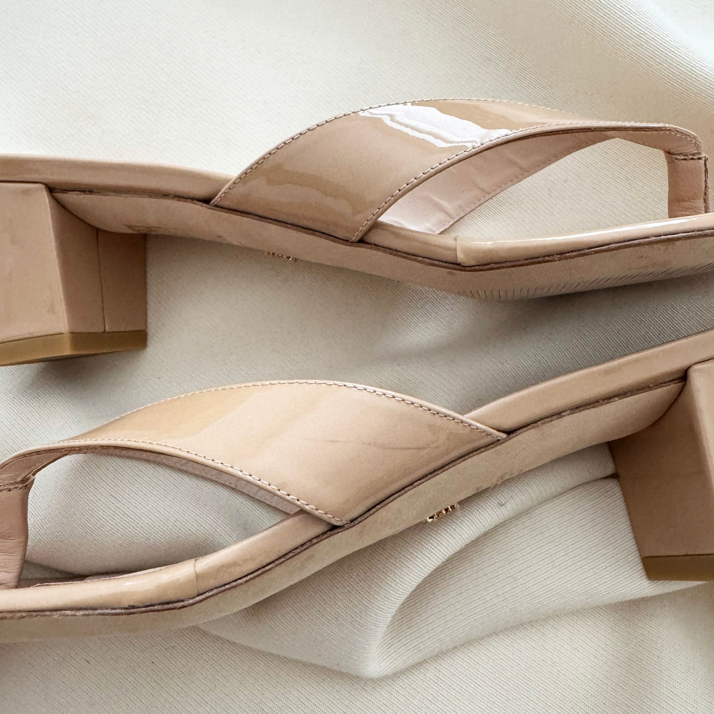 Stuart Weitzman "Brigida" 50mm Thong Sandals in Nude, size 9.5