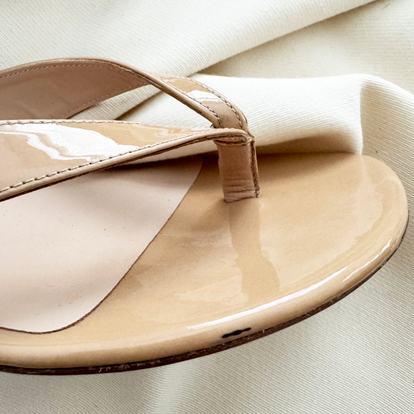 Stuart Weitzman "Brigida" 50mm Thong Sandals in Nude, size 9.5