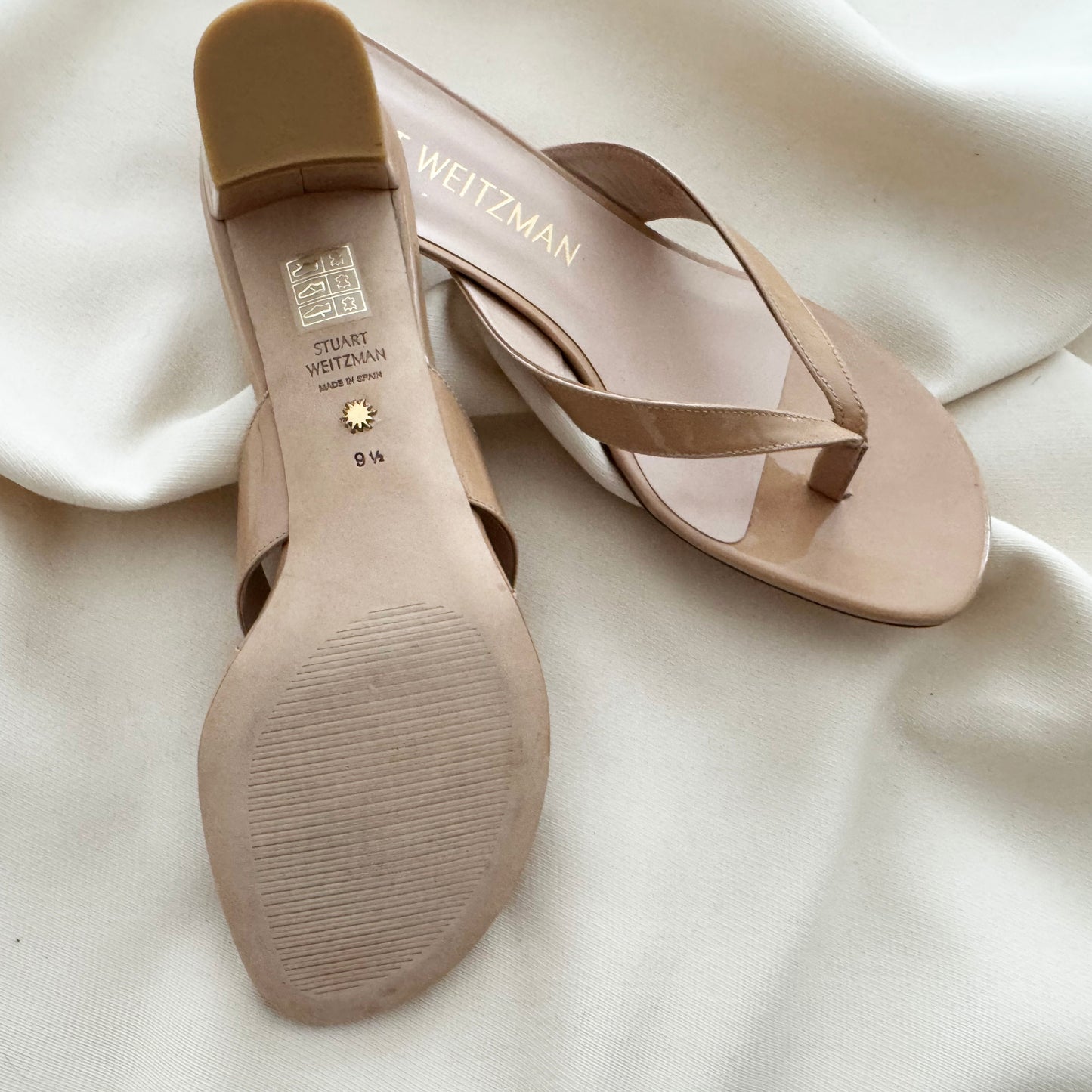 Stuart Weitzman "Brigida" 50mm Thong Sandals in Nude, size 9.5