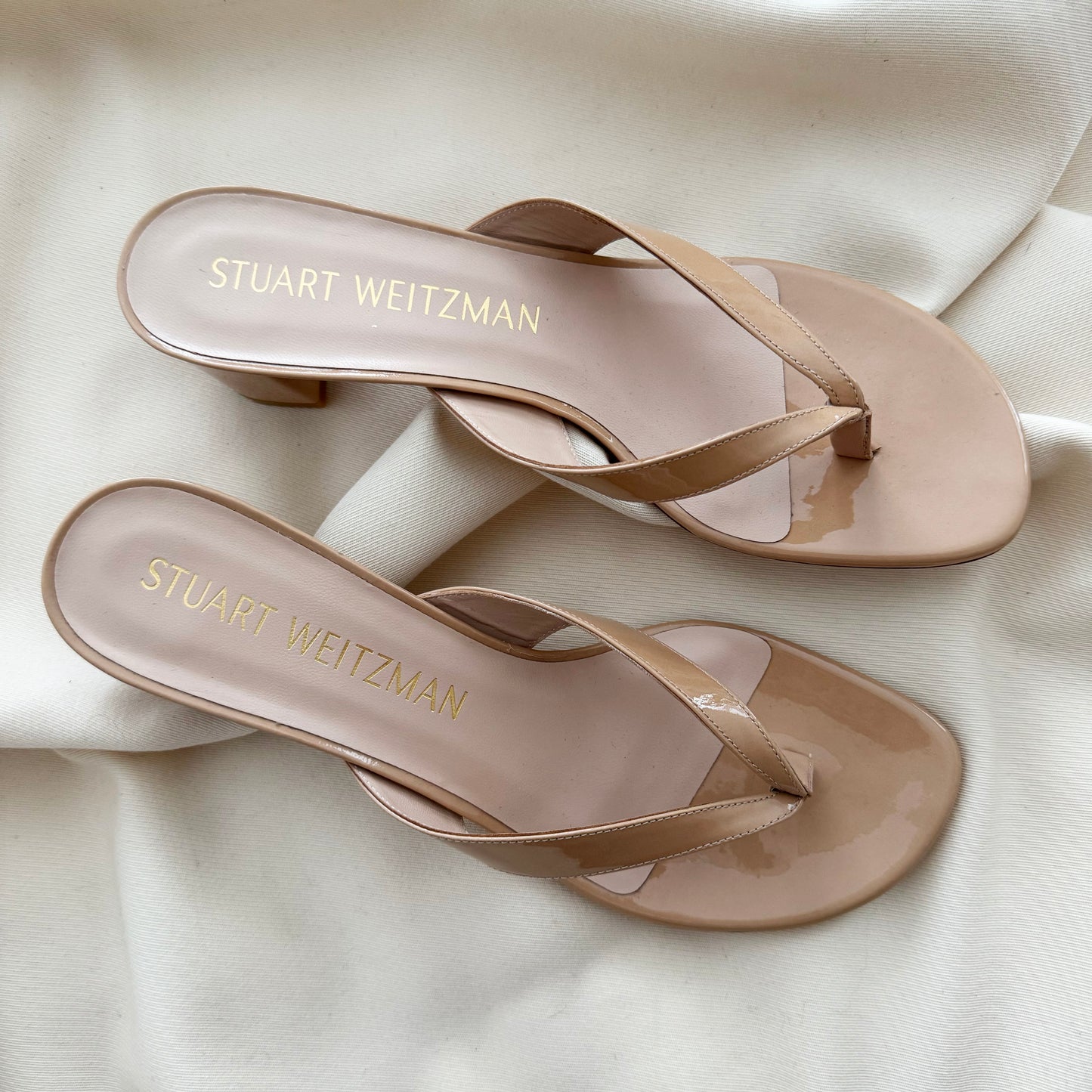 Stuart Weitzman "Brigida" 50mm Thong Sandals in Nude, size 9.5