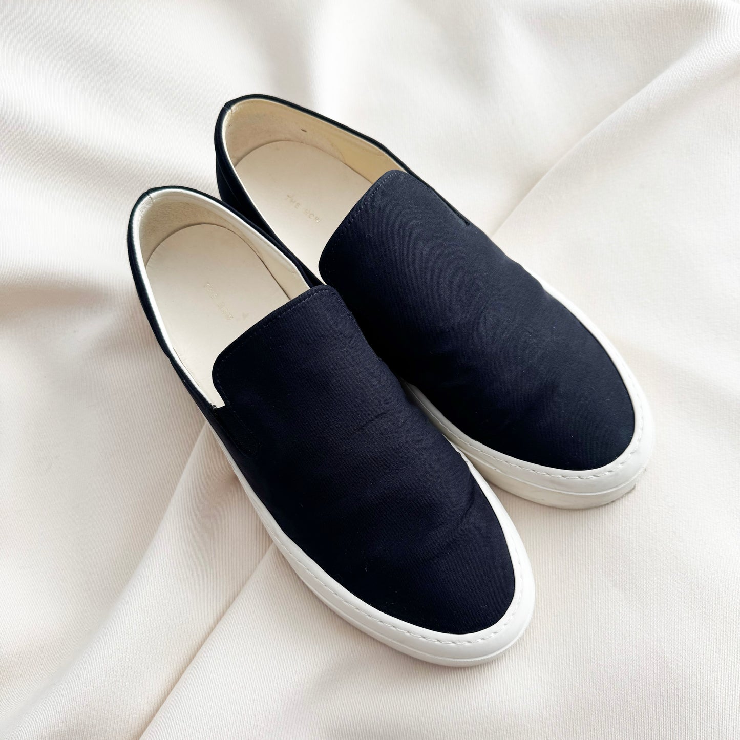The Row Slip on Canvas Sneakers in Black, size 38.5