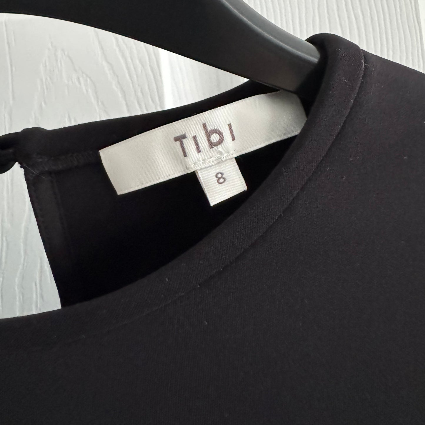 Tibi Compact Ultra Stretch Half Moon Cutout Sleeve Top in Black, size 8