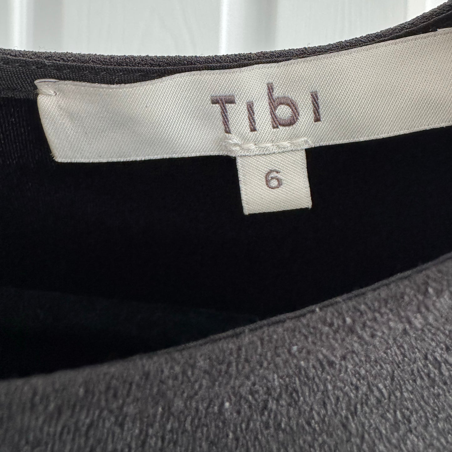 Tibi Structured Crepe Sculpted Shoulder Top in Black, size 6