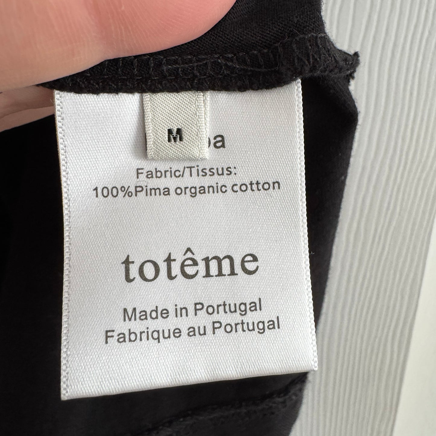 Toteme "Pemba" Flared Baby Tee in Black, size Medium